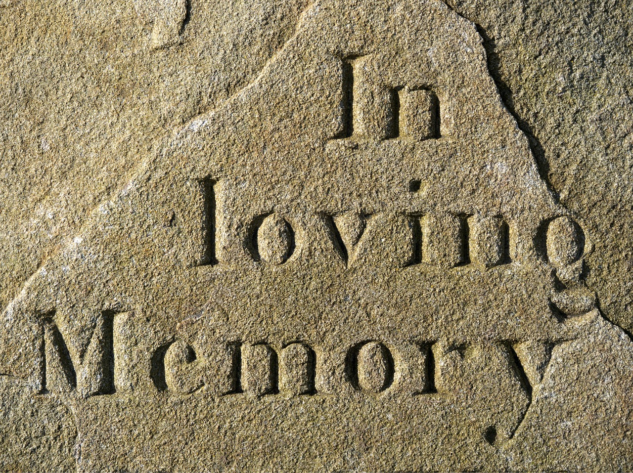 Image of headstone with "In loving memory" inscription