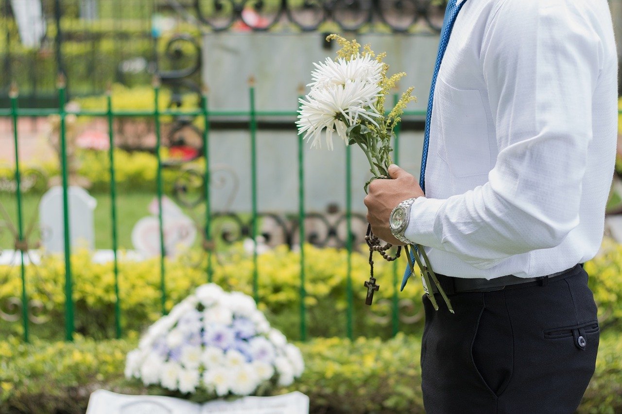 Image of someone at a funeral