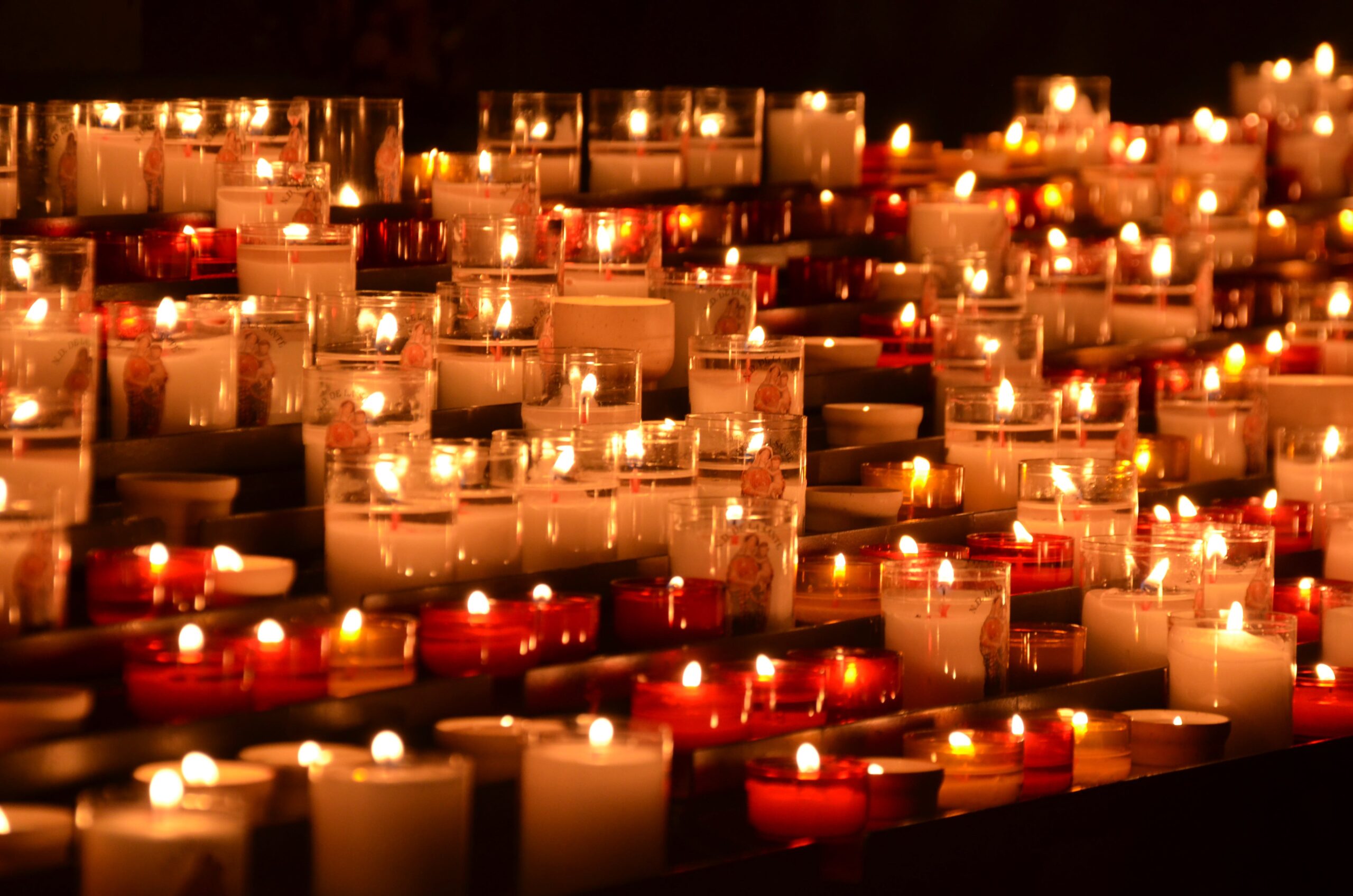 image of numerous lit candles